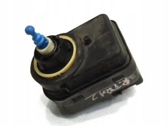 SILNICZEK REGULACJI LAMPY RENAULT TRAFIC II 7700415343